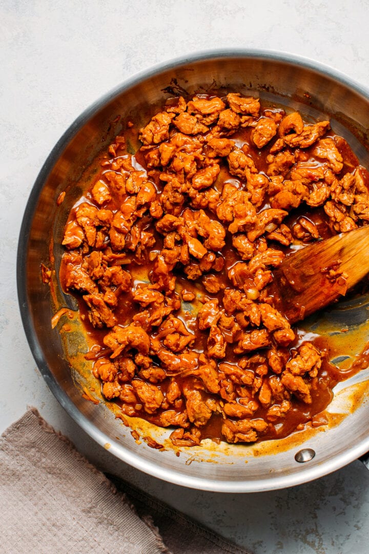 Cooking soy curls in hoisin sauce.