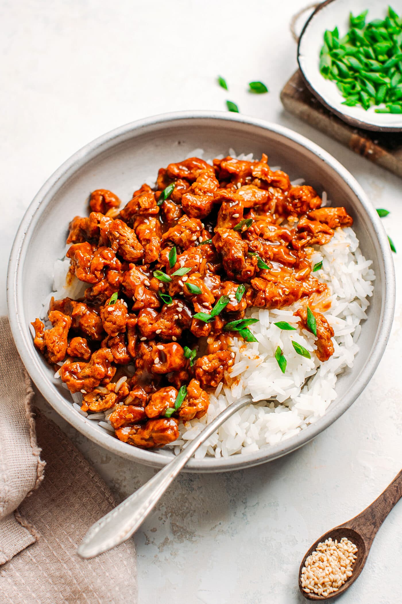 Soy curls on top of white rice.