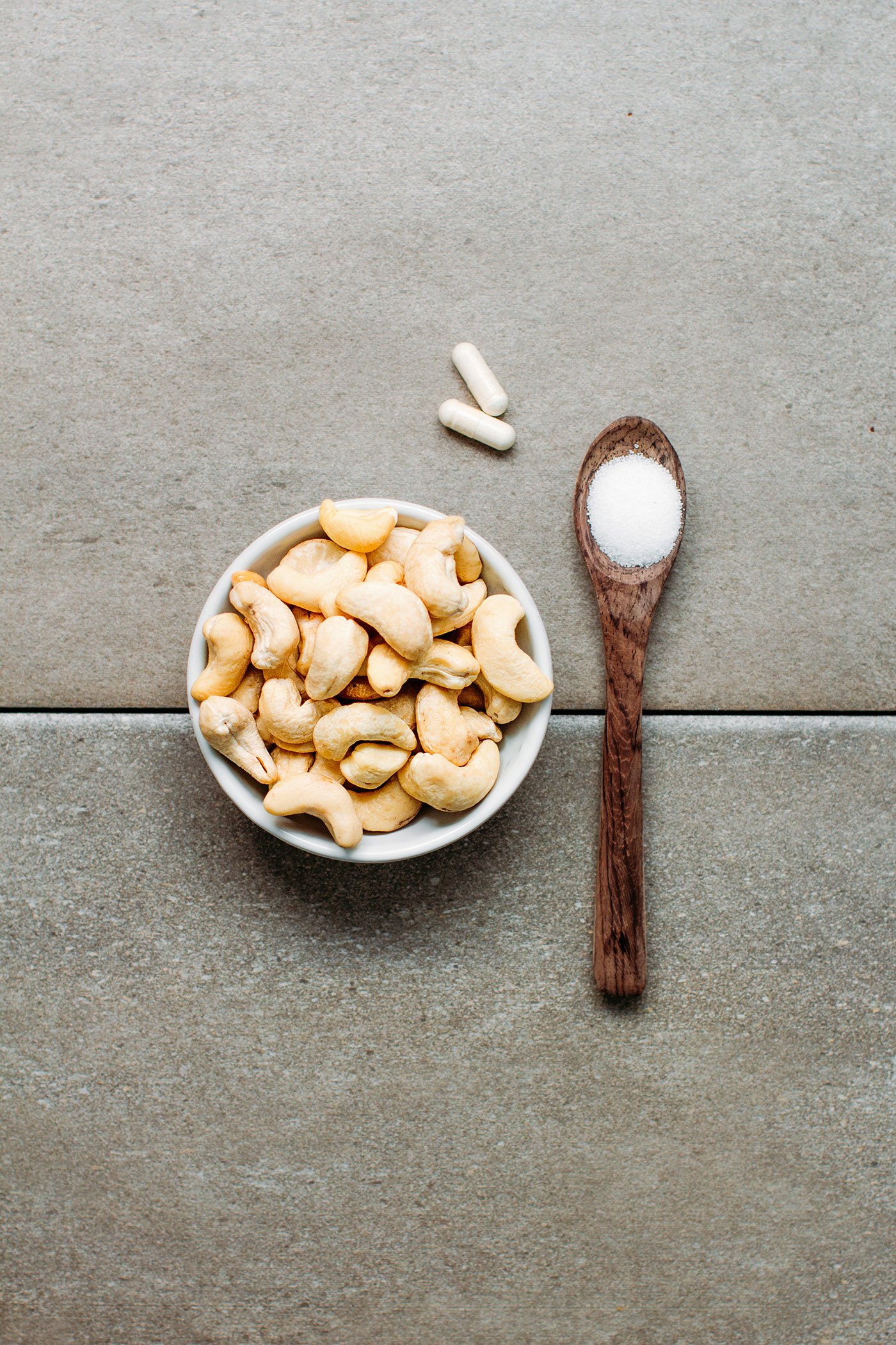 Ingredients to make vegan cream cheese, cashews, probiotics, salt