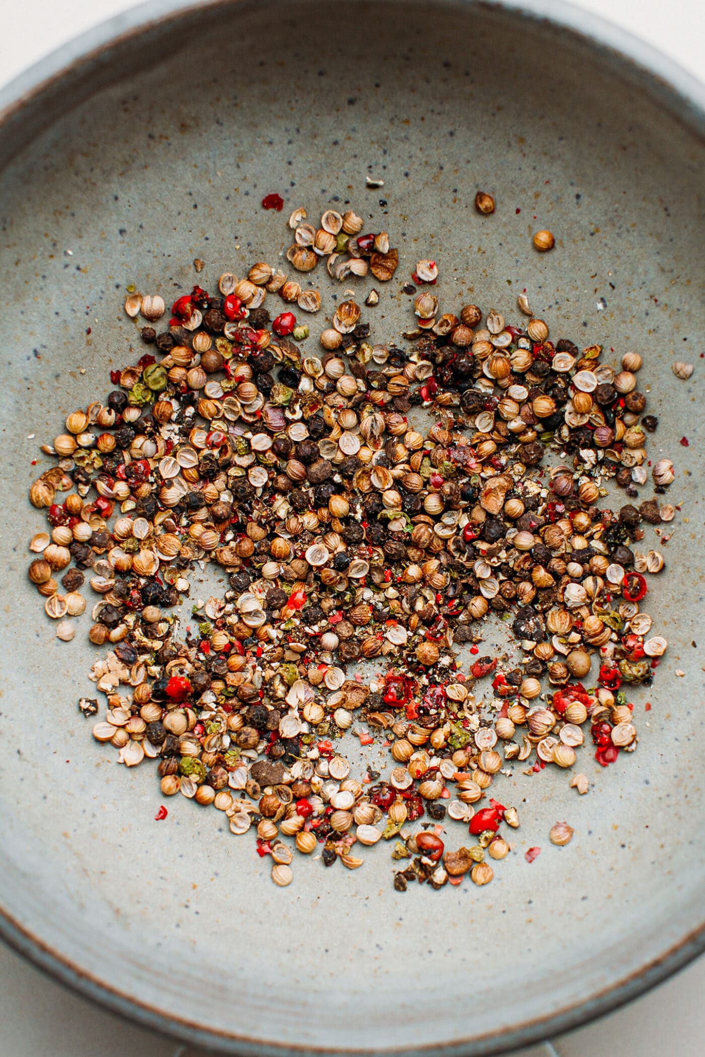 Close-up of crushed peppercorns.