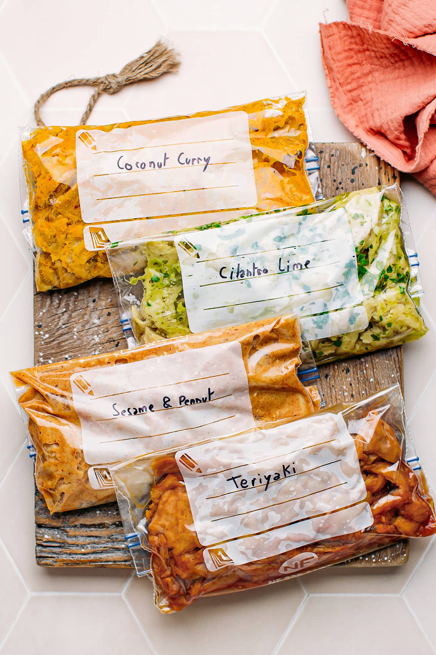 Vegan chicken marinades on a wooden board.