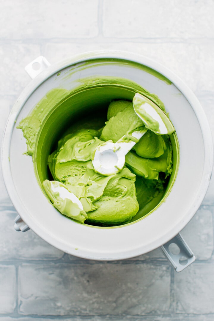 Churning vegan ice cream in a KitchenAid attachment.