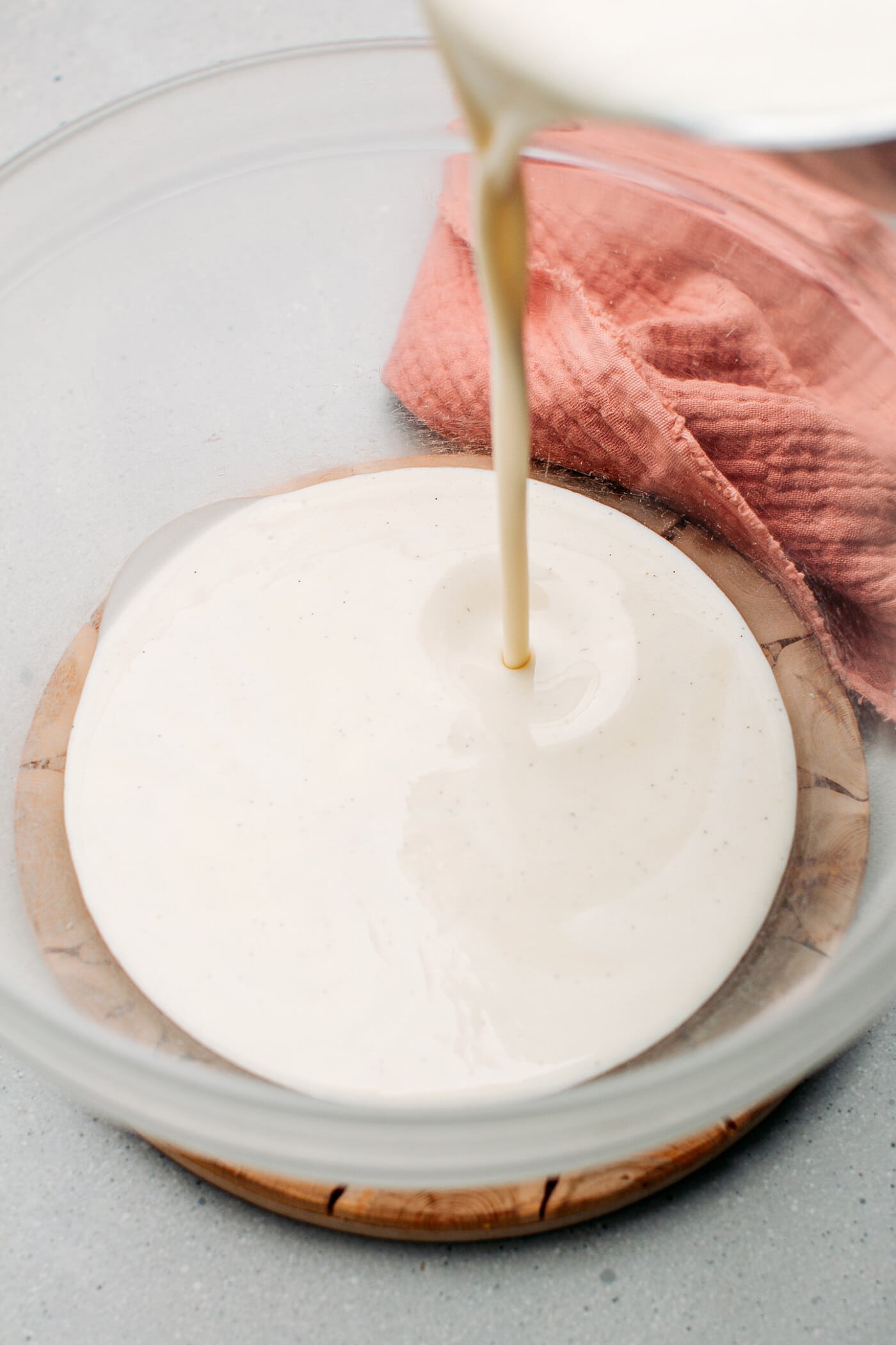 Pouring ice cream base in a bowl.