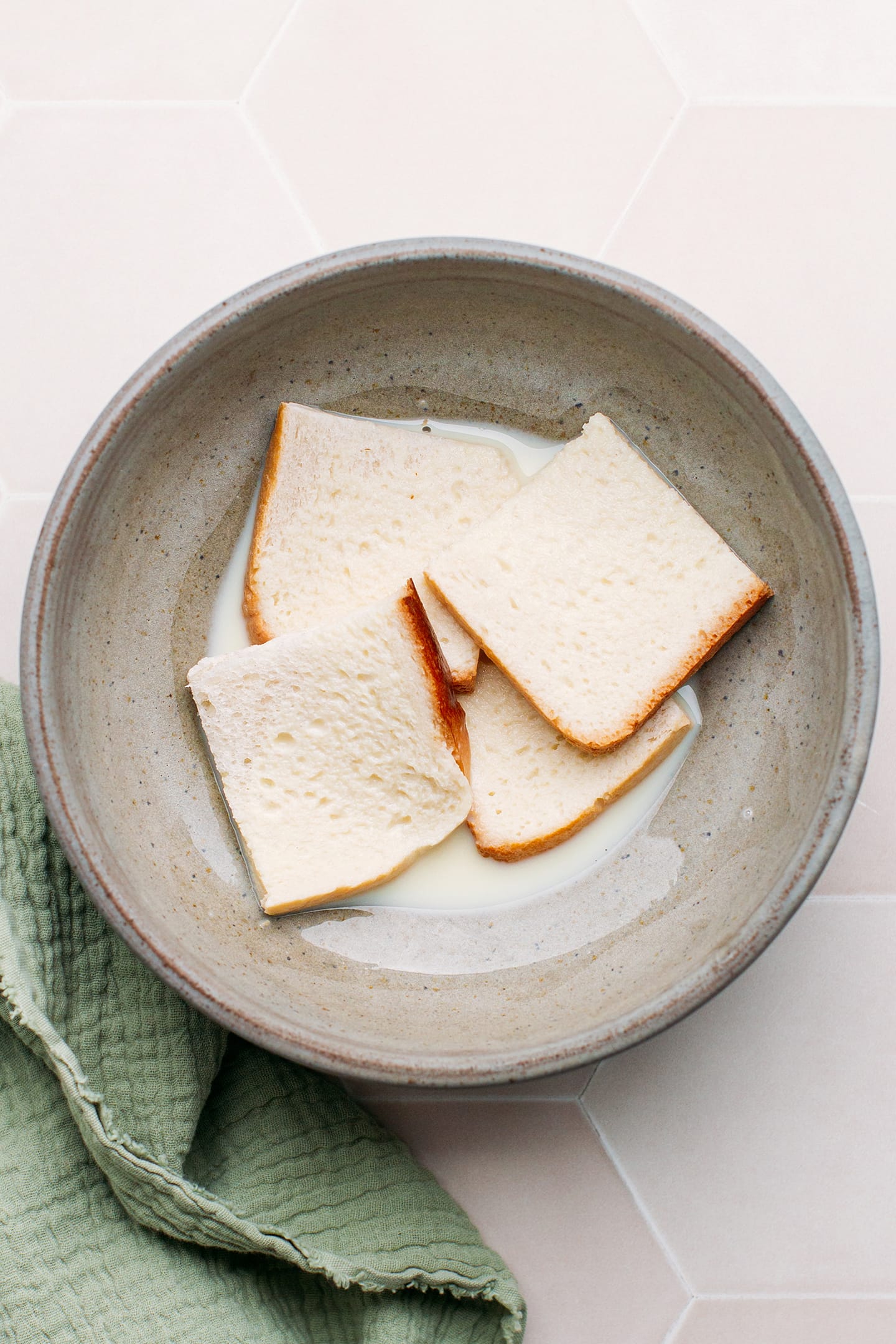 Bread soaking in almond milk.