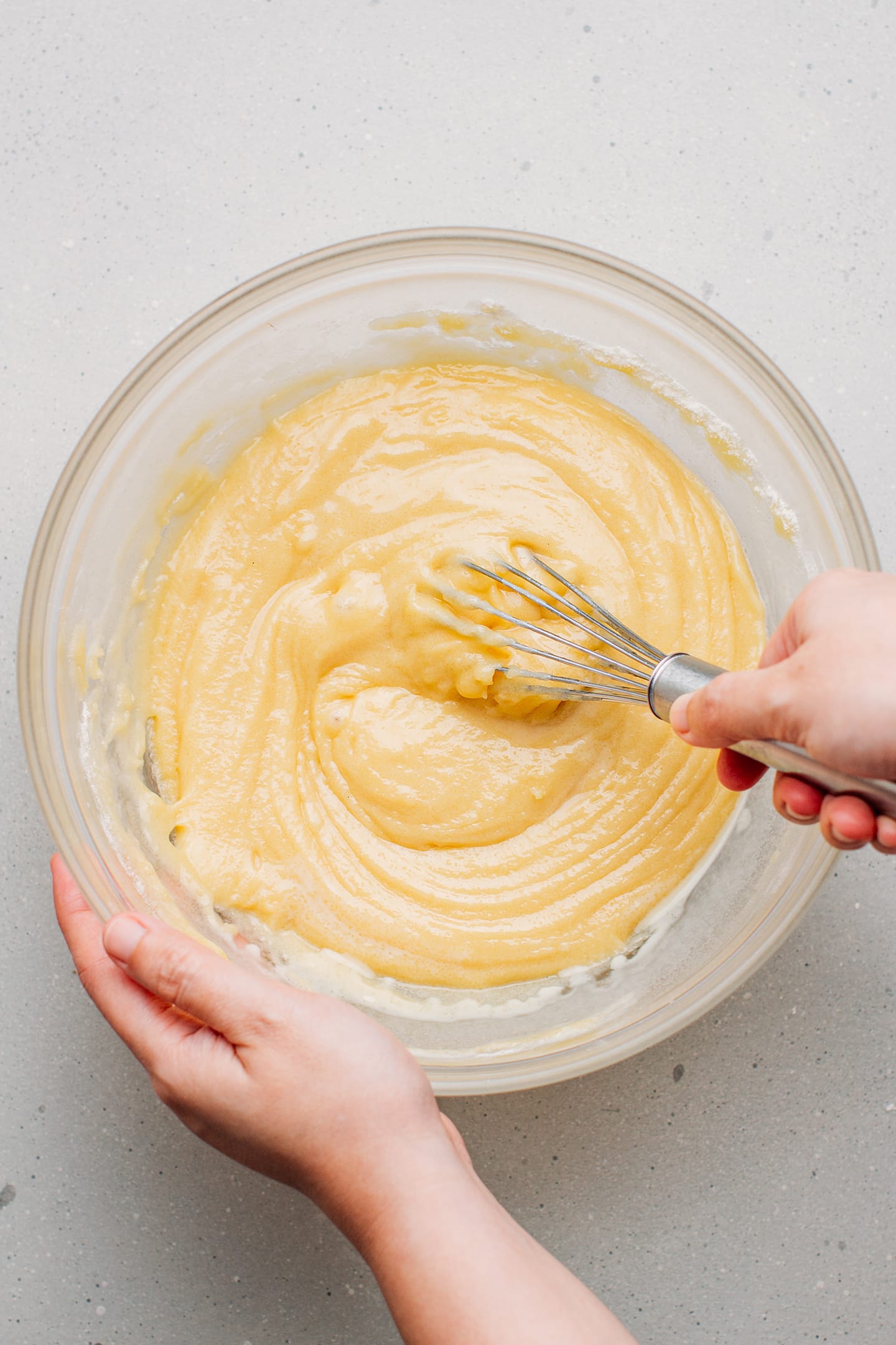 Whisking a batter for pound cake.