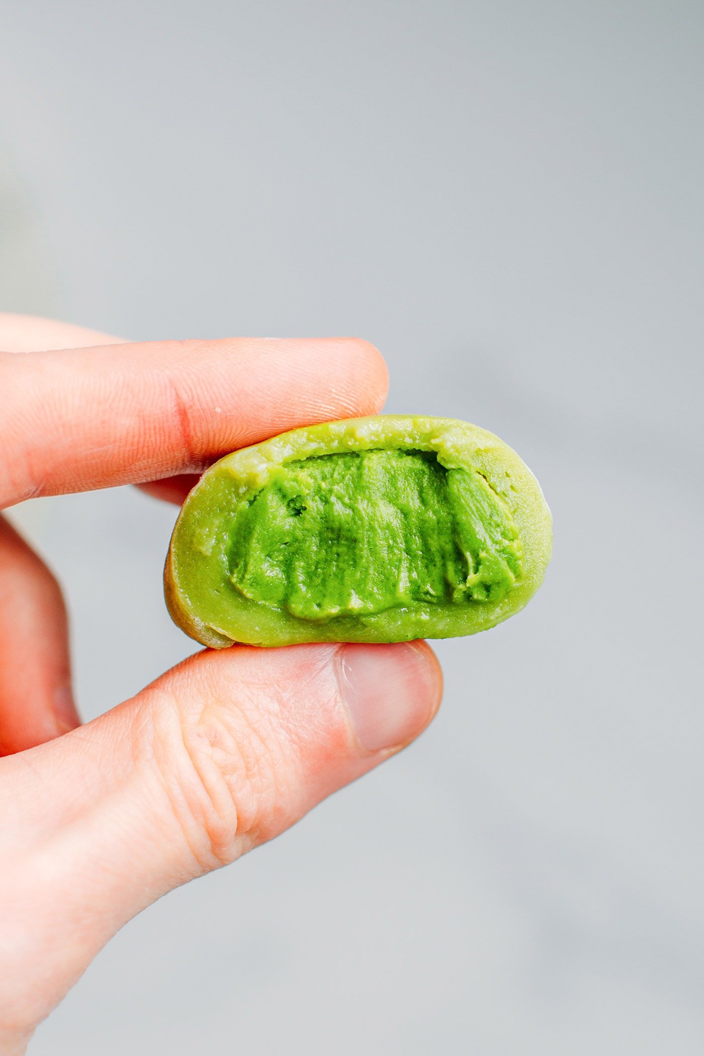 Bite of matcha mochi.