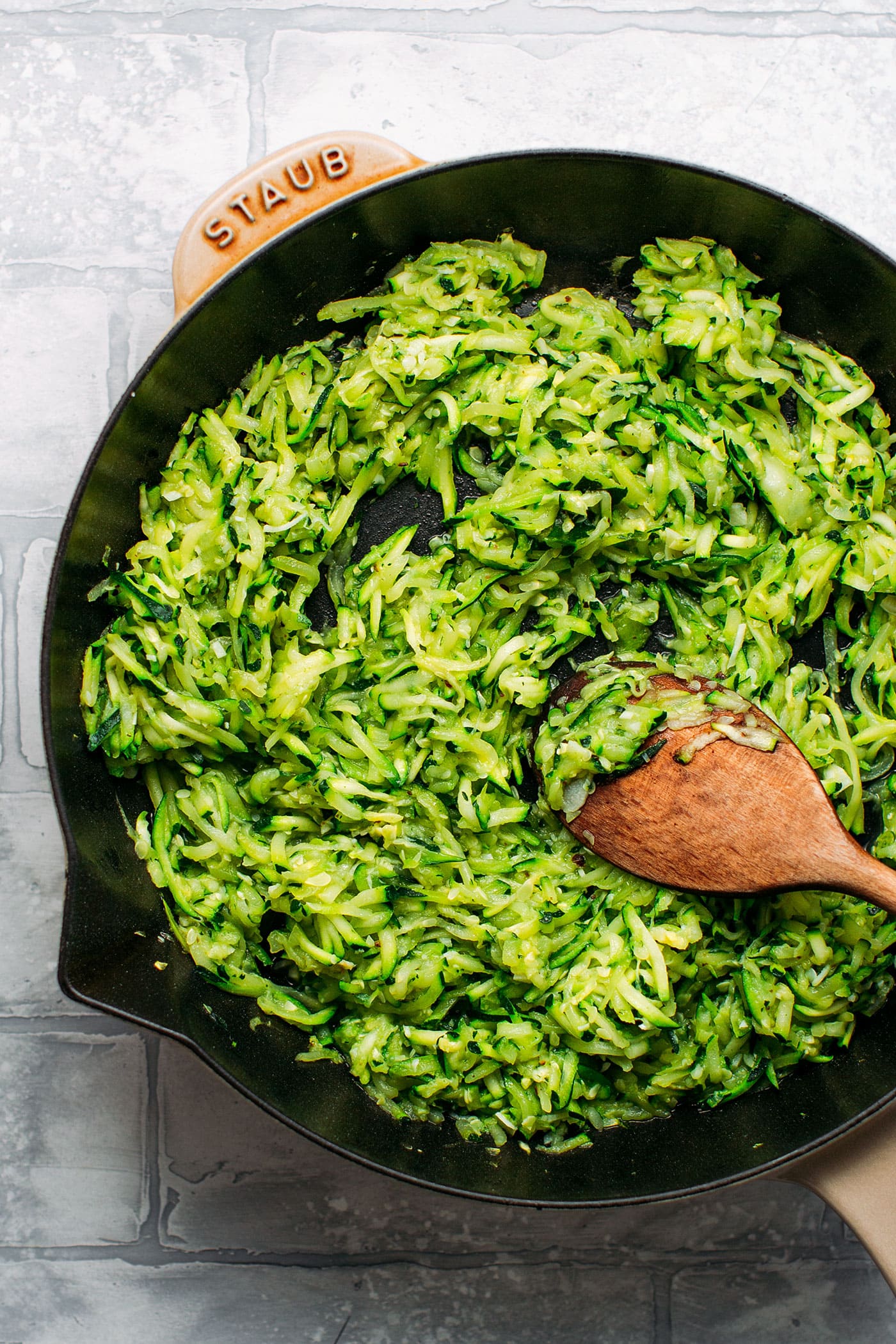 Sautéed grated zucchini.