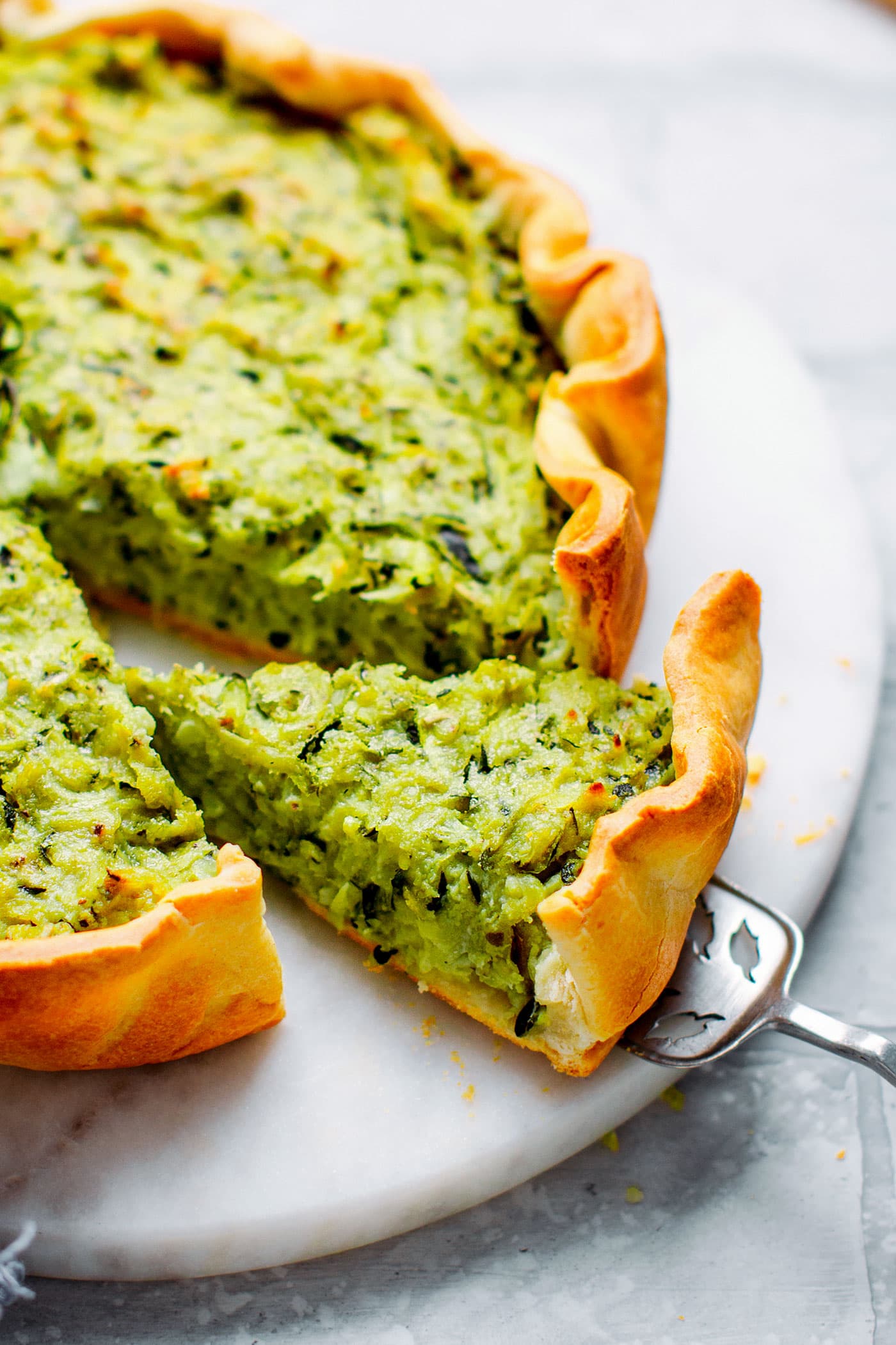 Slice of a savory zucchini tart.