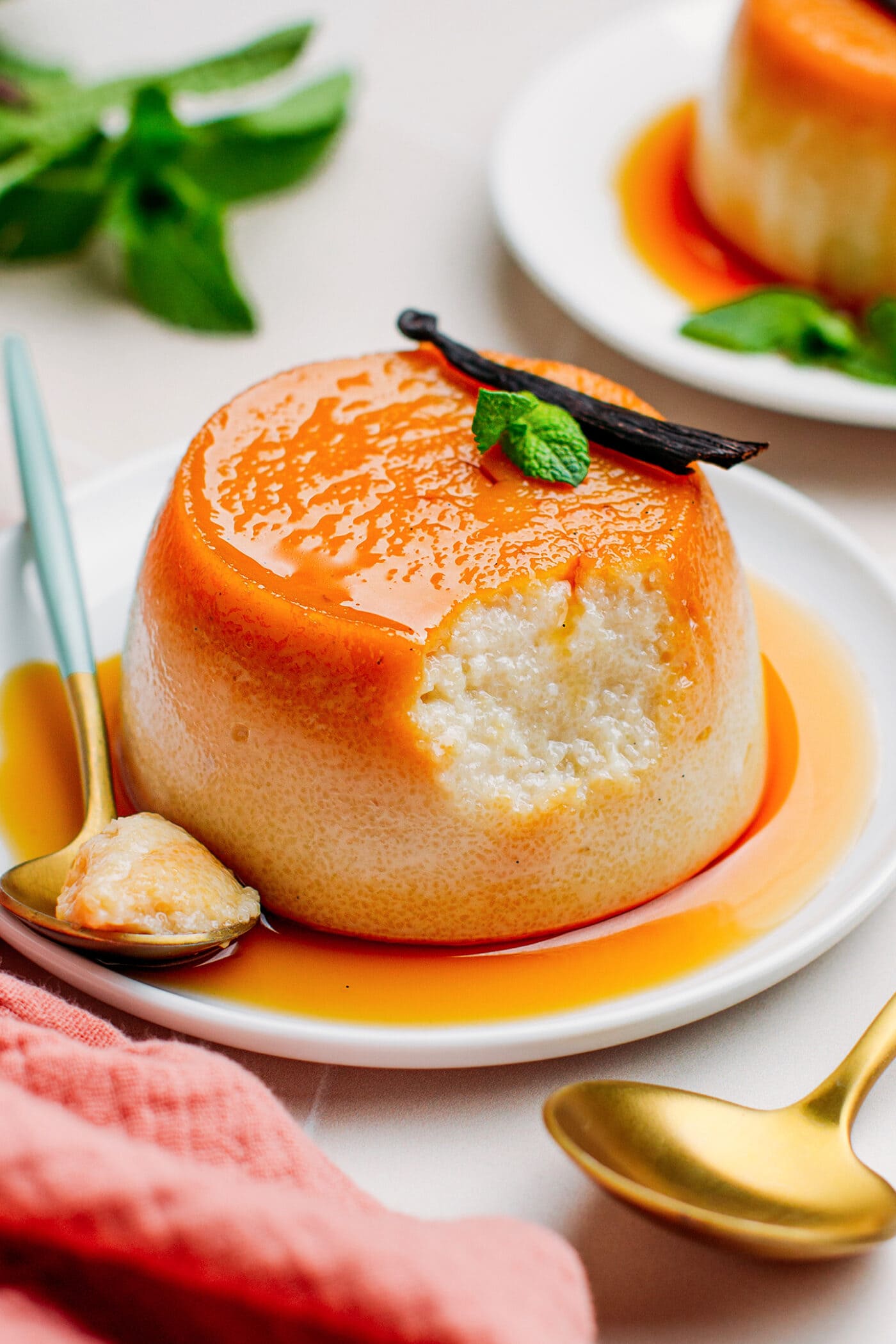 Semolina pudding with caramel sauce on a plate.