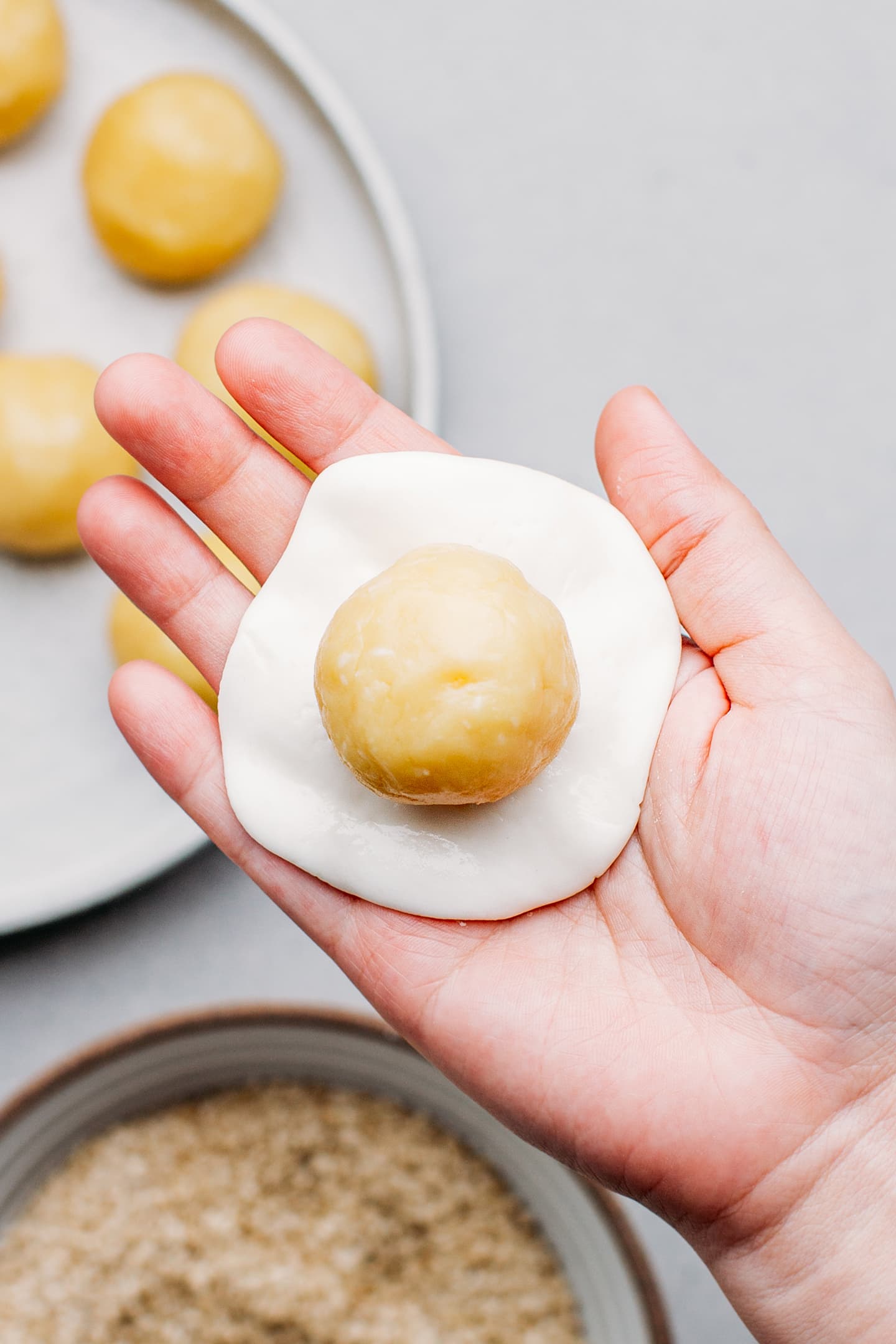 Mung bean paste on top of a wrapper.